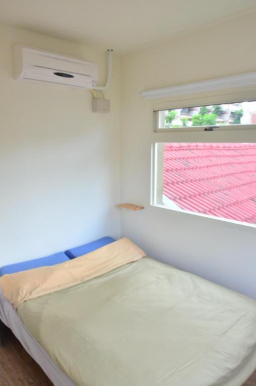 טאינאן City Hut 1828 חדר תמונה